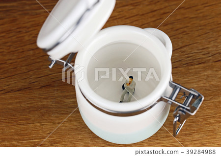 Businessman in a container Businessman in a container 39284988