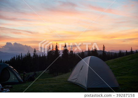 Tent on a camping site in the mountains Tent on a camping site in the mountains 39287158