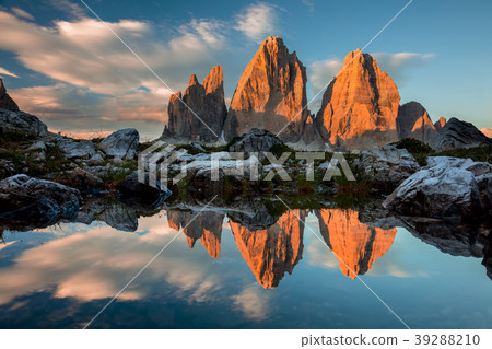 Tre Cime di Lavaredo with reflection in lake Tre Cime di Lavaredo with reflection in lake 39288210