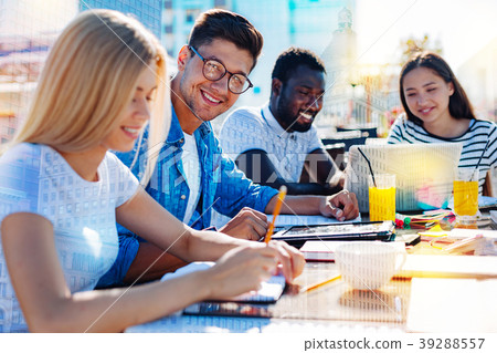 Joyful man working in a team Joyful man working in a team 39288557