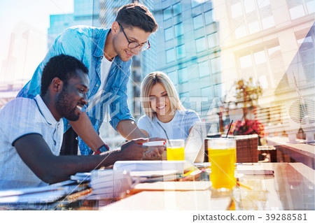 Content co-workers discussing the project 39288581