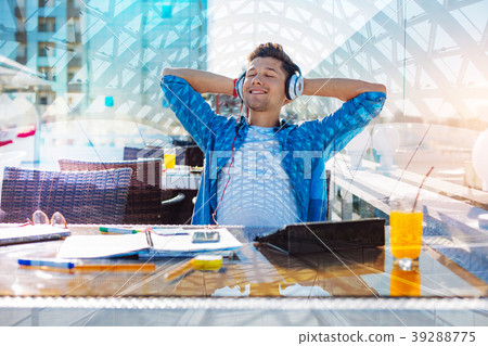 Cheerful man relaxing with his eyes closed 39288775