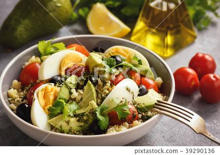 Bulgur salad with eggs, avocado, tomatoes . 39290136