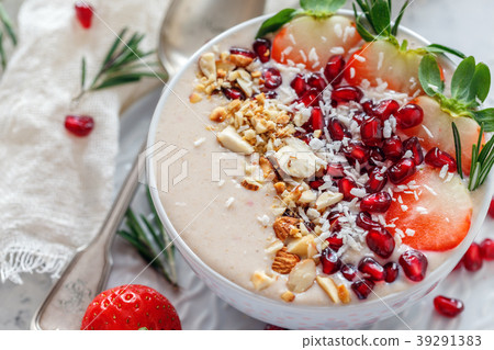 Smoothie bowl of strawberries and almonds. Smoothie bowl of strawberries and almonds. 39291383