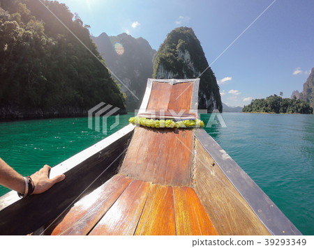 Tropical Thai jungle lake Cheo lan wood boat, wild Tropical Thai jungle lake Cheo lan wood boat, wild 39293349