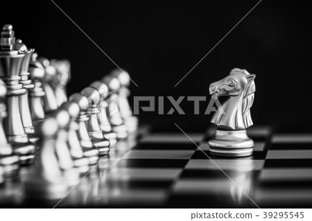 The King in battle chess game stand on chessboard The King in battle chess game stand on chessboard 39295545