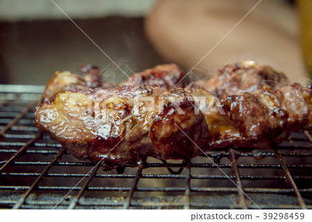 Grilled pork bone on charcoal stove 39298459