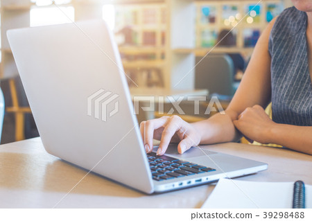 Business woman hand working with a laptop computer 39298488