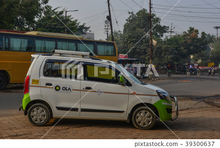 Ola car on street in Agra, India 39300637