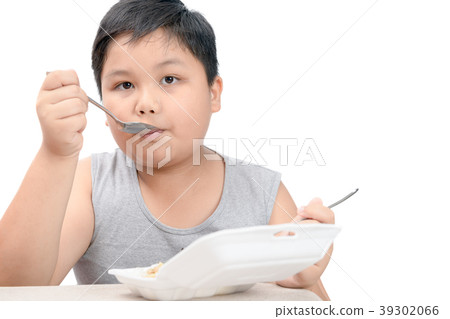 Obese fat boy eating fried rice in foam box Obese fat boy eating fried rice in foam box 39302066