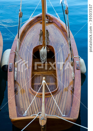 two brown wooden small sailing boats in Tivat 39303587