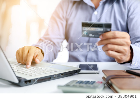 businessman do online shopping with credit card businessman do online shopping with credit card 39304901
