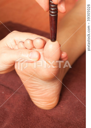 reflexology foot massage by wood stick reflexology foot massage by wood stick 39305026