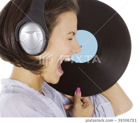 brunette in headphones with vinyl record  39306781