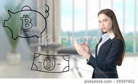 Surprised smiling young woman wearing a suit and 39307902