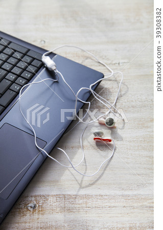 Laptop and headphones Laptop and headphones 39308382