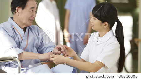 Hospital wheelchair senior man Hospital wheelchair senior man 39310303