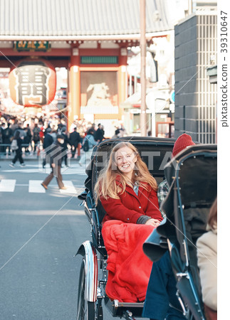 Foreign tourists on a rickshaw 39310647