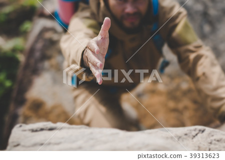 The young man was reaching for help. The young man was reaching for help. 39313623