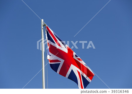 UK flag on a flagpole UK flag on a flagpole 39316346