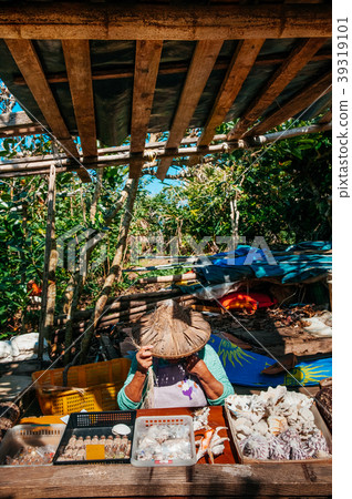 Okinawan woman in local souvenir shop Iriomote 39319101