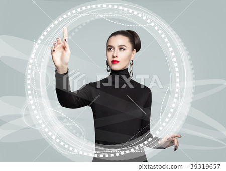 Young model business woman using virtual screen 39319657