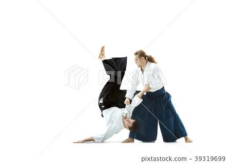 The two men fighting at Aikido training in martial 39319699