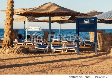 day on the beach straw umbrellas, beach chairs day on the beach straw umbrellas, beach chairs 39320378