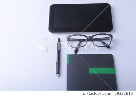 Modern white office desk table with laptop Modern white office desk table with laptop 39322619