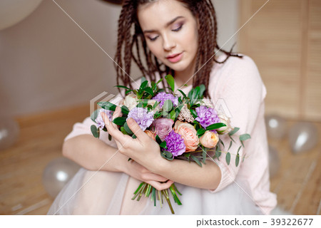 Smiling woman with dreadlocks hairstyle. Smiling woman with dreadlocks hairstyle. 39322677