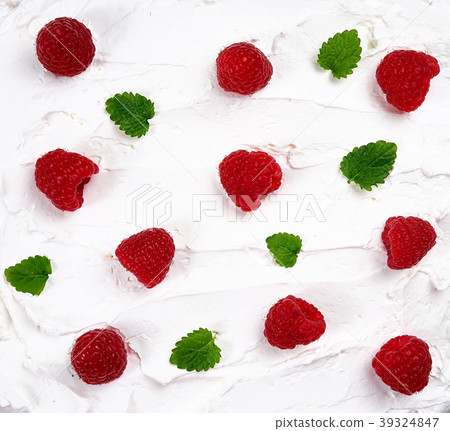 Whipped cream texture decorated with raspberry Whipped cream texture decorated with raspberry 39324847