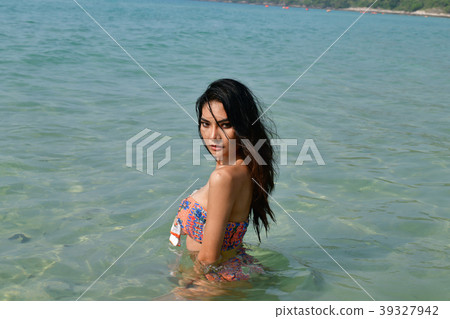 Sexy girl concept in swimsuit. Beautiful woman wearing a swimsui Sexy girl concept in swimsuit. Beautiful woman wearing a swimsui 39327942