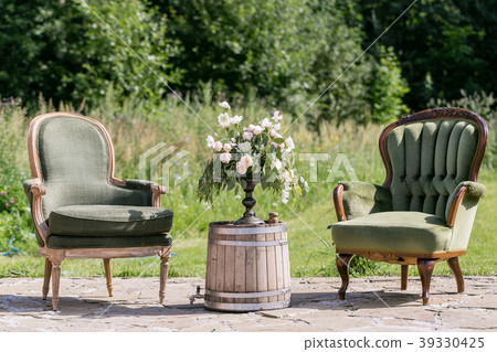 Vintage wood chairs and table with flower 39330425