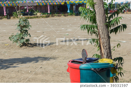 Trash in a park. Trash in a park. 39331597