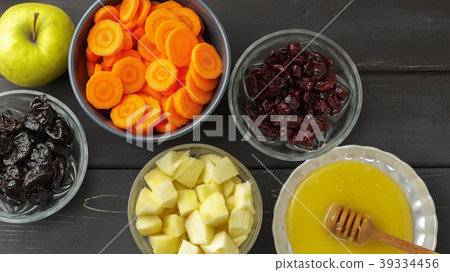 Carrot, apples, honey, dried prunes and cranberry 39334456