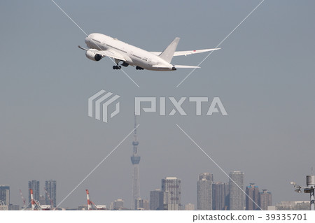 B787 took off Tokyo Sky Tree in the background 39335701