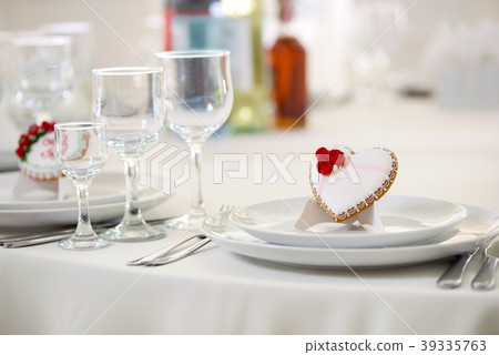 Delicious glazed gingerbread cookie on the festive Delicious glazed gingerbread cookie on the festive 39335763
