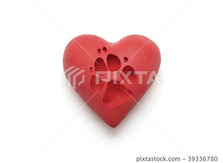 Red heart with dog paw print over white background 39336780