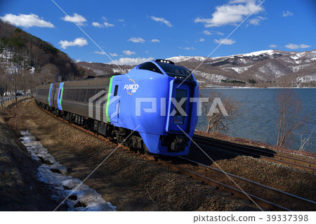 Photographing the scenery of the pendulum express of the JR Hakodate Line that runs along Lake Onuma in Onuma Quasi-National Park in spring Photographing the scenery of the pendulum express of the JR Hakodate Line that runs along Lake Onuma in Onuma Quasi-National Park in spring 39337398