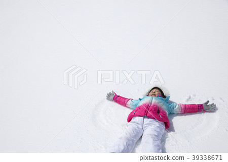Children lying on snow Winter image 39338671