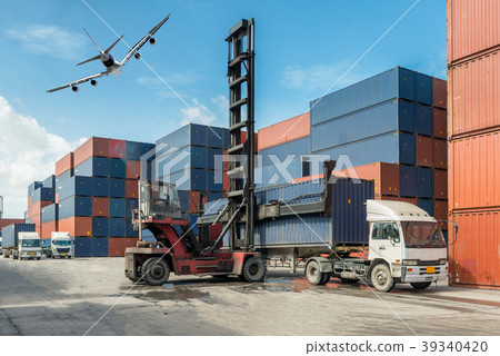 Forklift handling container box loading at docks Forklift handling container box loading at docks 39340420