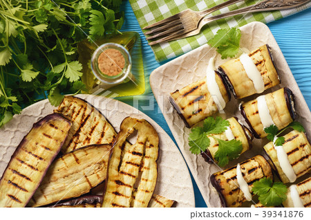 Grilled eggplants rolls with cream cheese, garlic  39341876