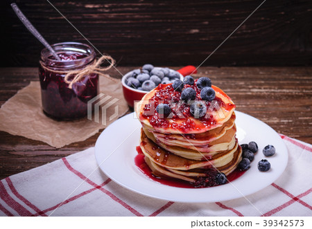 American pancakes with jam and blueberries American pancakes with jam and blueberries 39342573