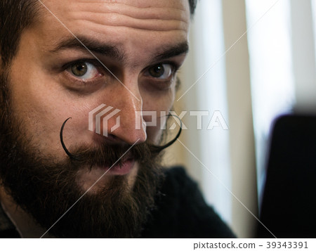 Modern, Expressive Bearded Office Clerk with Modern, Expressive Bearded Office Clerk with 39343391
