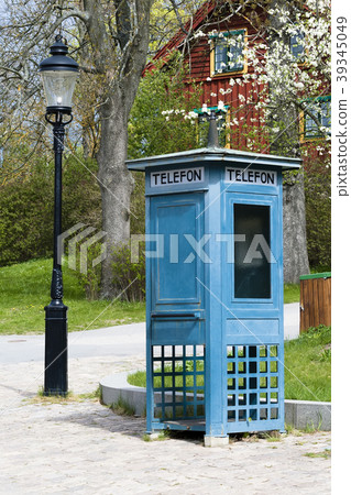 Phone booth and old lantern Phone booth and old lantern 39345049