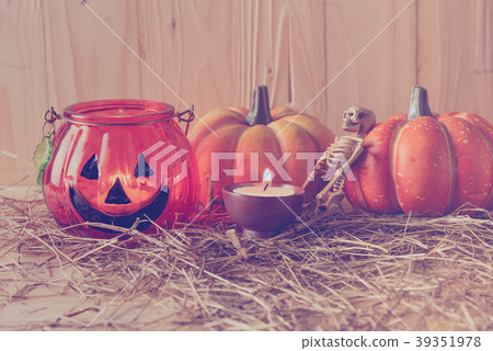 Halloween pumpkin and ornament on wood table. Halloween pumpkin and ornament on wood table. 39351978