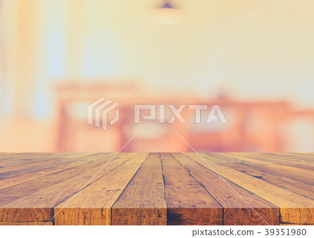wood table and blur restaurant . wood table and blur restaurant . 39351980