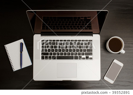 Top view of the open laptop, notebook with pen Top view of the open laptop, notebook with pen 39352891