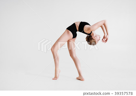 Slim ballerina on a white background Slim ballerina on a white background 39357578
