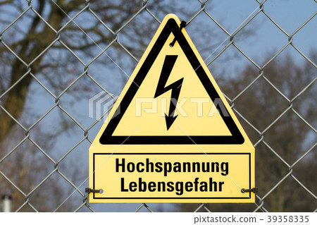 Yellow sign high voltage Danger 39358335